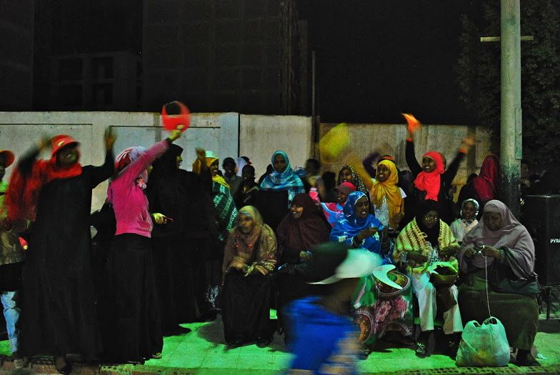 Migrant and refugee women from various Horn of Africa countries chaperone at a festival for children held in the Cairo neighborhood of Ard el Lewa (2013, Kelsey Norman).